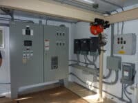 Walk In PumpMate interior Inside of Walk In PumpMate. Showing control panels.