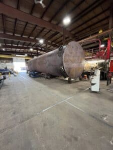 Tank in fabrication building being worked on