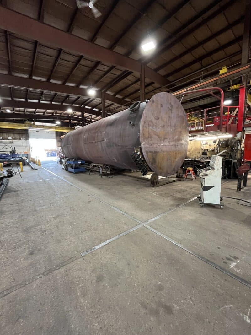 Tank in fabrication building being worked on