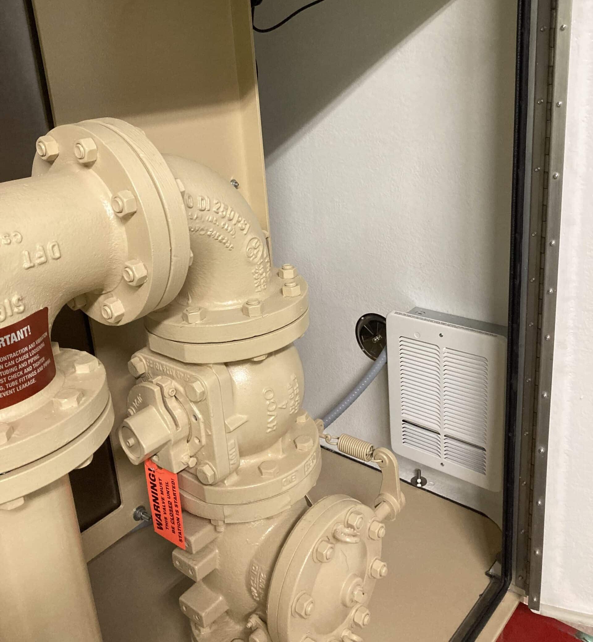 Heater and exhaust fan mounted to wall