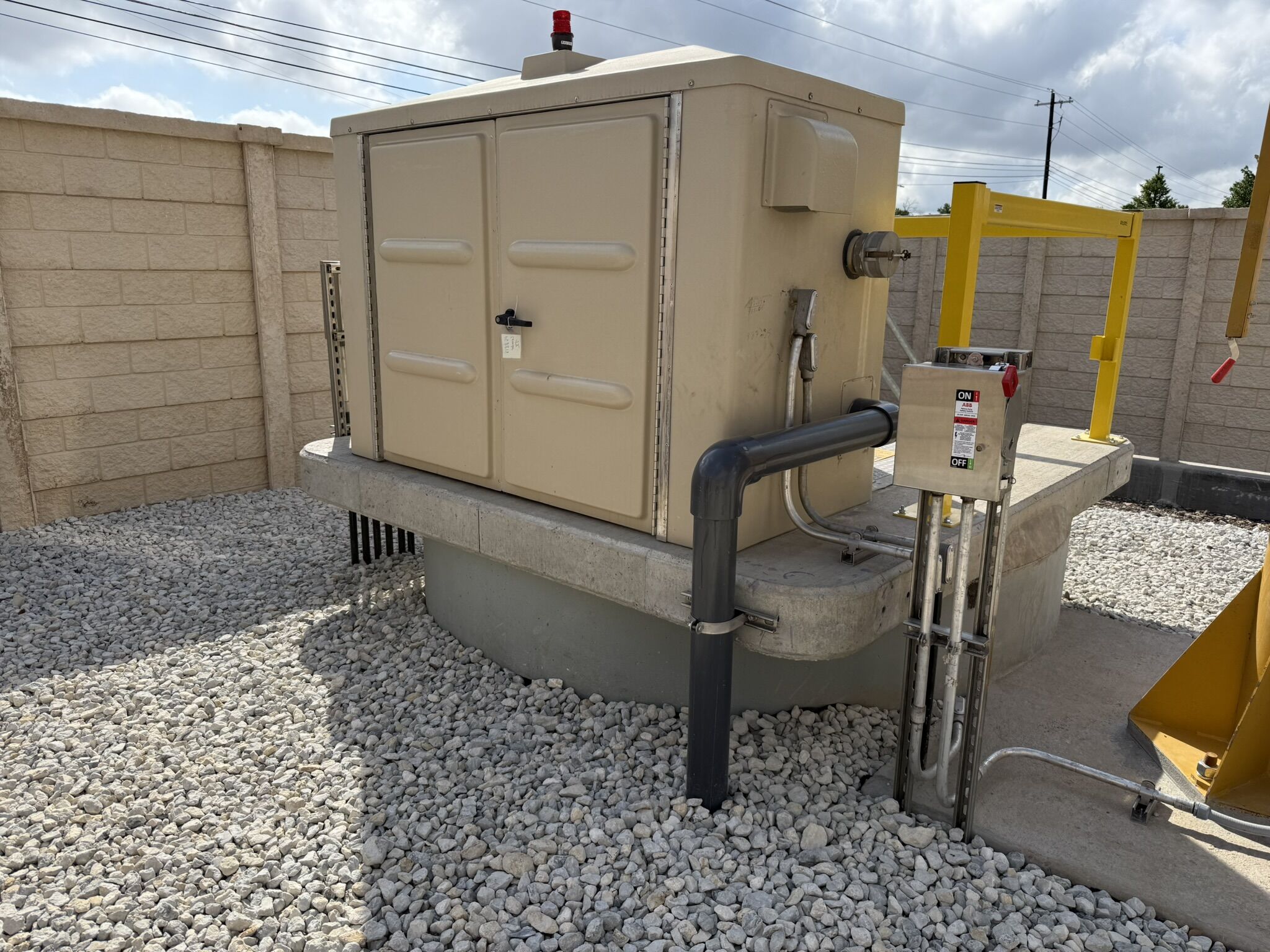 Unload and place directly on top of the wet well