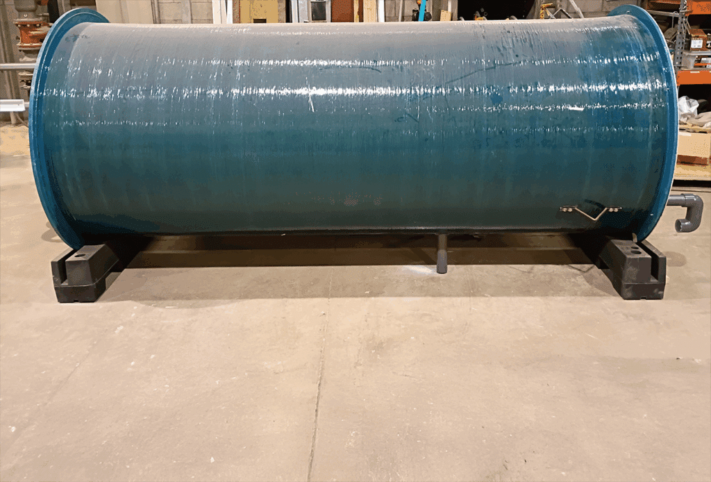 USEMCO packaged submersible fiberglass pump station Fiberglass submersible station in the factory.