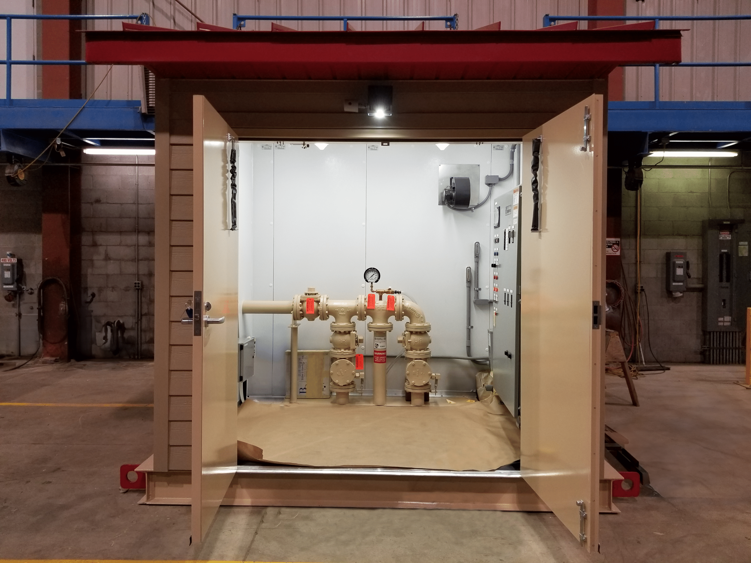 walk-in-pumpmate-open-doors Walk In PumpMate with open doors showing the interior piping.